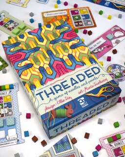 Threaded: A Game of Needles and Points